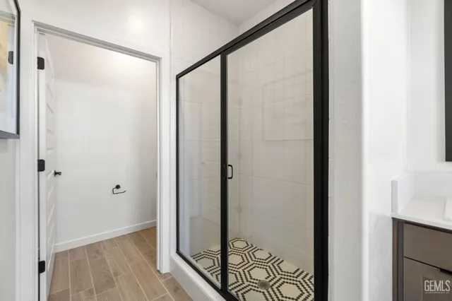 a view of a bathroom with a glass door