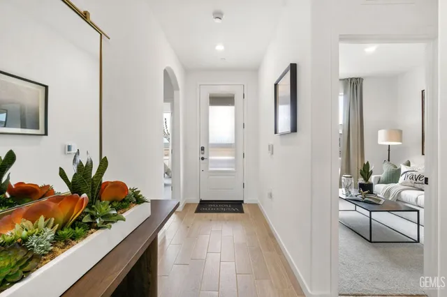 a hallway with view of living room