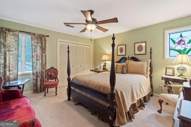 a bed room with a bed and furniture