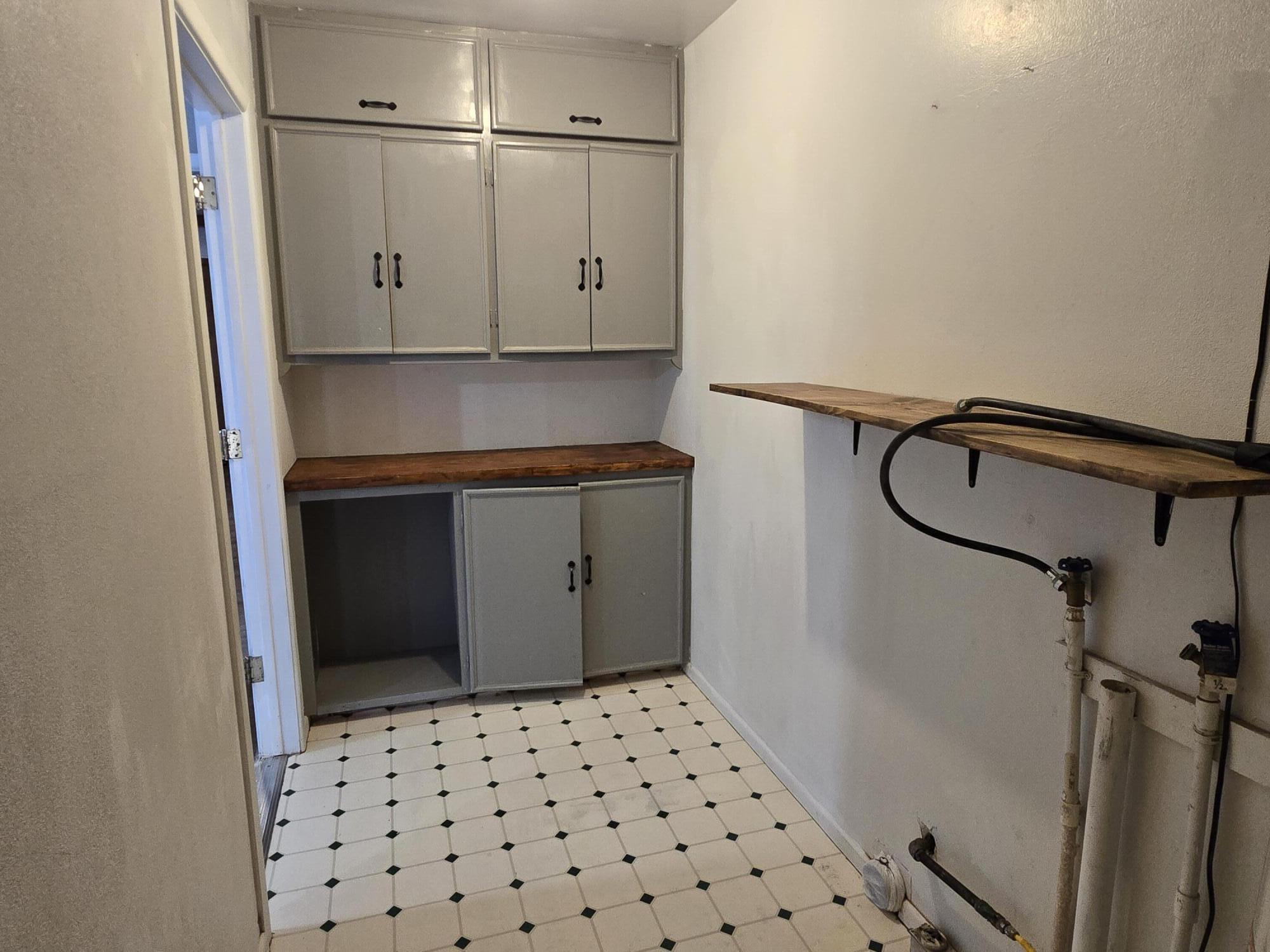 506 North 19th Street Lamesa, TX 79331 - Photo 19 of 29 a bathroom with a shower and a sink