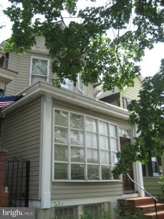 a view of a house with a balcony