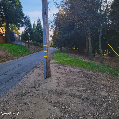 a street sign on the side of the road