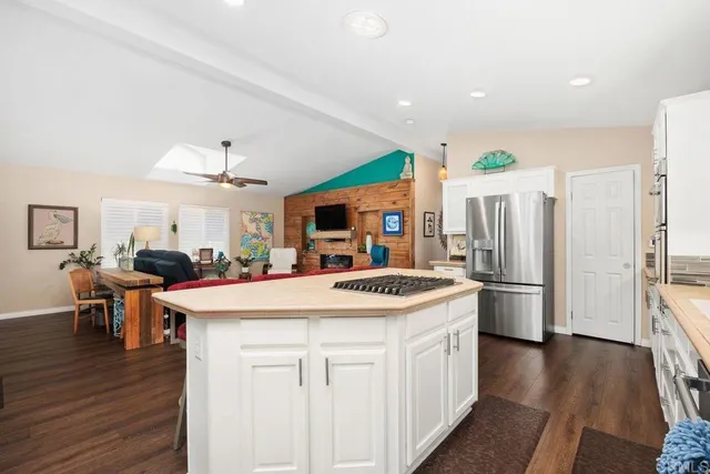a bed room with a bed and a book shelf