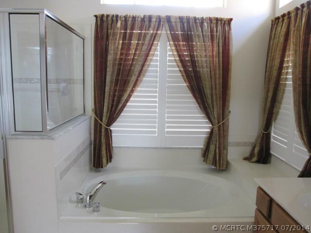 1909 Southwest Panther Trace Stuart, FL 34997 - Photo 21 of 25 Master Bath/Spa. Roman Tub in Master