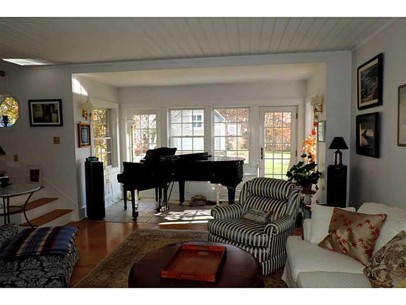 1024 Mere Point Road Brunswick, ME 04011 - Photo 15 of 32 Living Room. Sun room off of living...