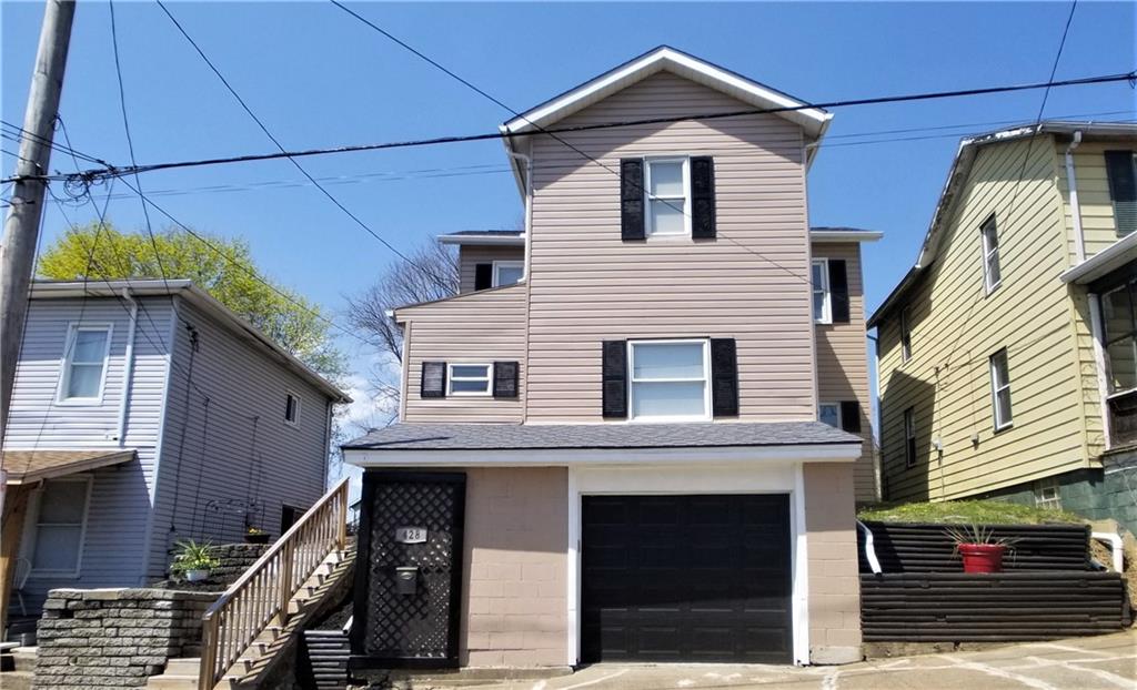 428 East Washington Street Rochester, PA 15074 - Photo 1 of 25 a view of a house with a yard