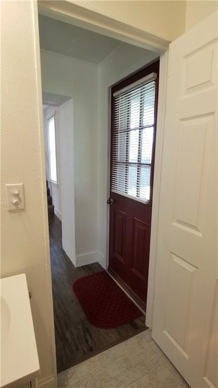428 East Washington Street Rochester, PA 15074 - Photo 13 of 25 a view of entryway with wooden floor and cabinet