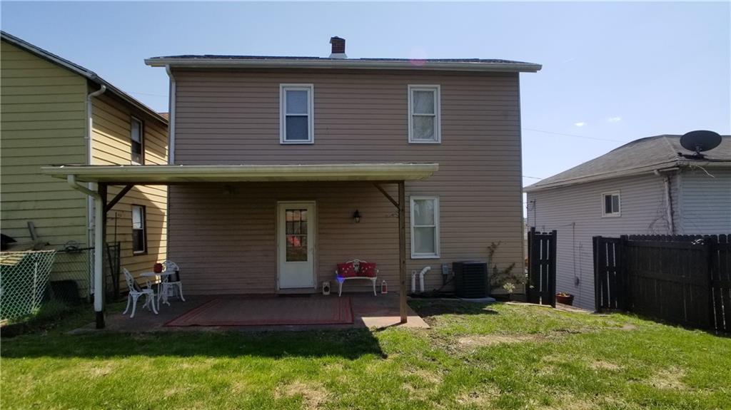 428 East Washington Street Rochester, PA 15074 - Photo 23 of 25 a front view of a house with a yard