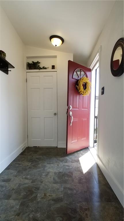 428 East Washington Street Rochester, PA 15074 - Photo 3 of 25 an empty room with wooden floor and fan