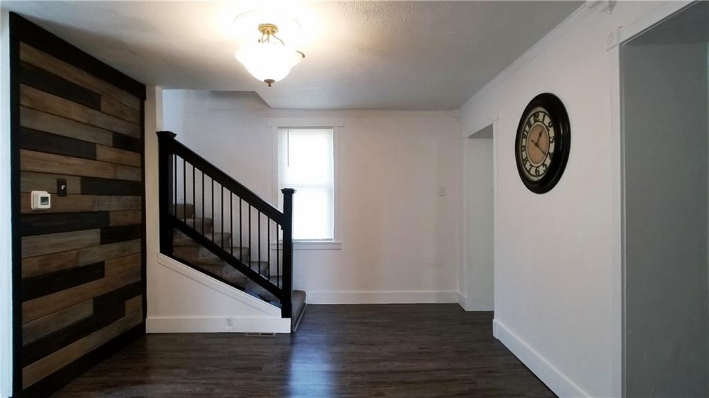 428 East Washington Street Rochester, PA 15074 - Photo 5 of 25 a view of hallway with wooden floor