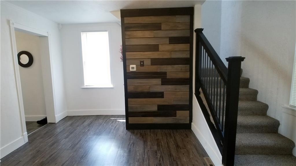 428 East Washington Street Rochester, PA 15074 - Photo 6 of 25 wooden floor in an empty room