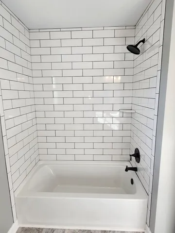 a bathroom with a bathtub