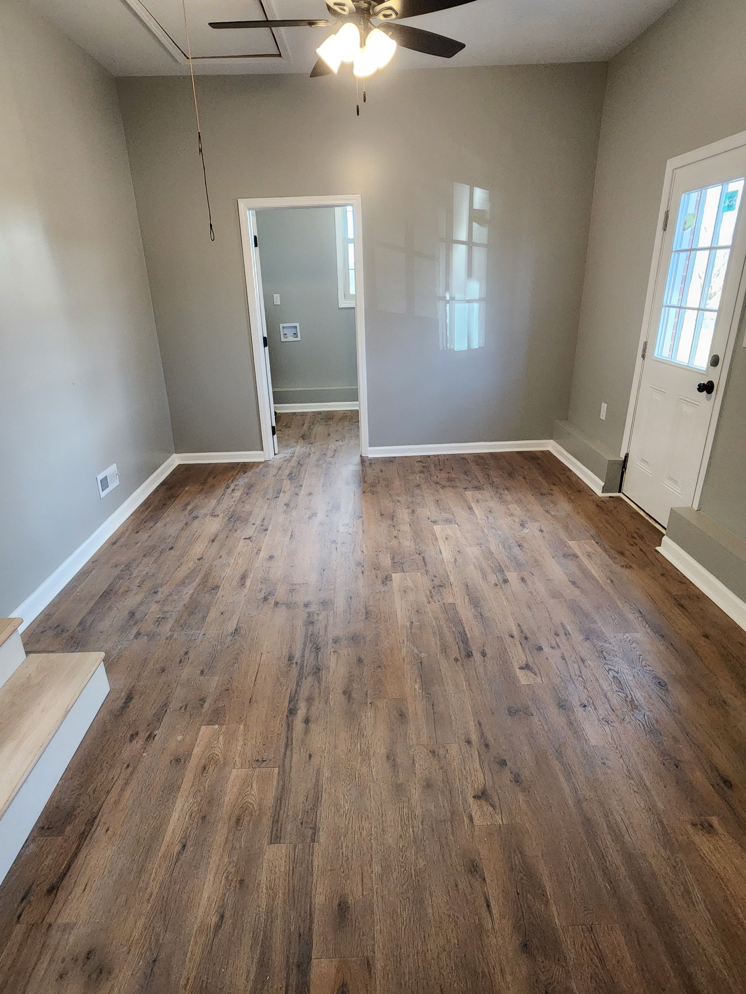 1715 Vales Mill Road Pulaski, TN 38478 - Photo 28 of 28 an empty room with wooden floor and windows