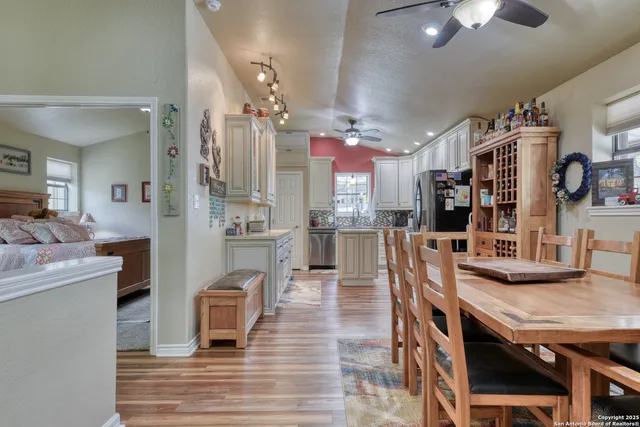 a view of a kitchen and dining room