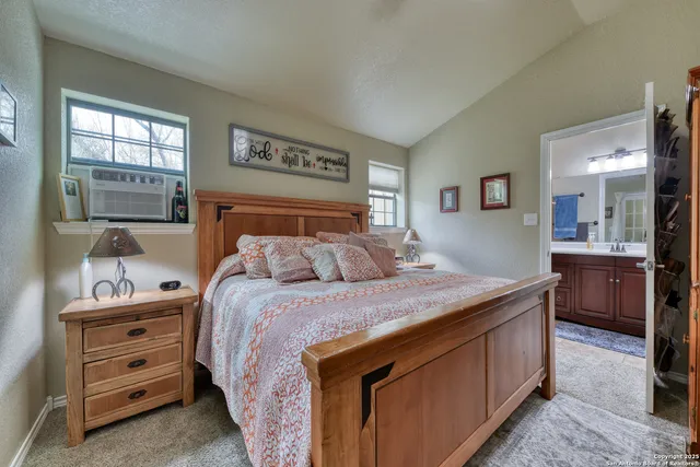 a bed room with a bed and a dresser