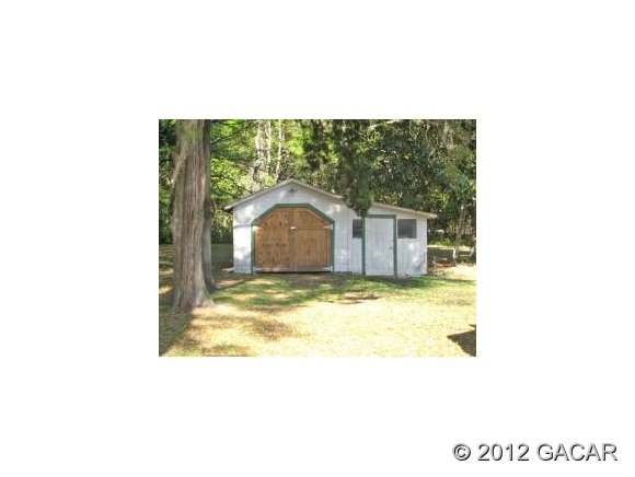 610 Southwest 2nd Street High Springs, FL 32643 - Photo 2 of 10 Shed / Washer and Dryer