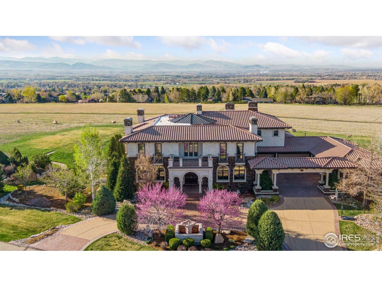 6541 Legend Ridge Trail Niwot, CO 80503 - Photo 1 of 45 an aerial view of a house with a garden
