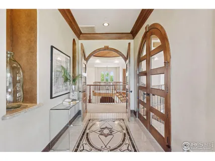 a view of a living room and a wooden floor