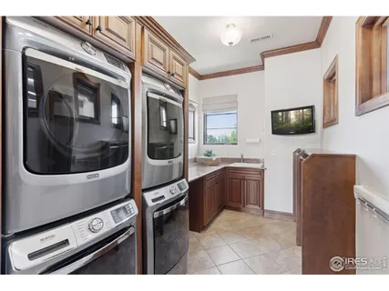 a kitchen with stainless steel appliances kitchen island a stove and a microwave