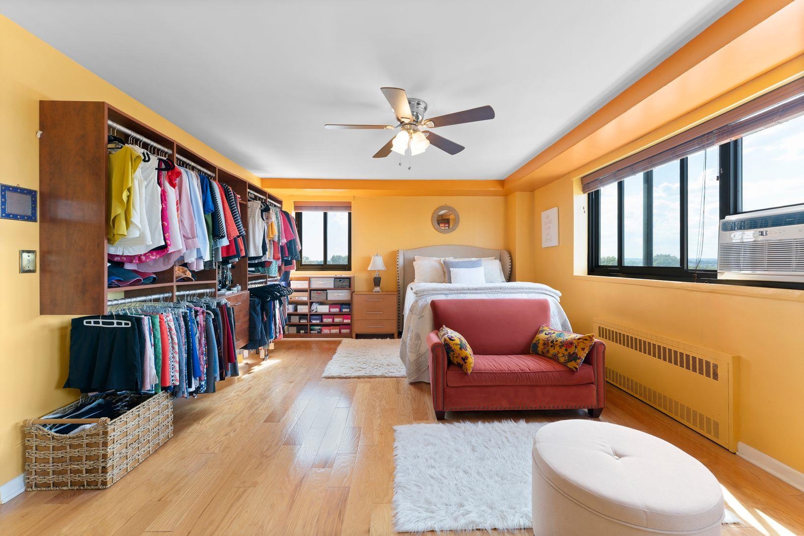 90 Prospect Avenue, Unit 9B Hackensack, NJ 07601 - Photo 7 of 12 a living room with furniture a ceiling fan and a window