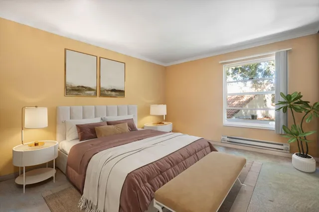 a bedroom with a large bed and a window with outer view