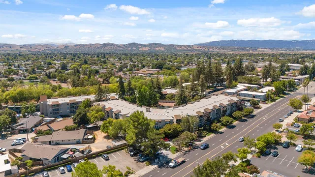 a view of a city with mountains