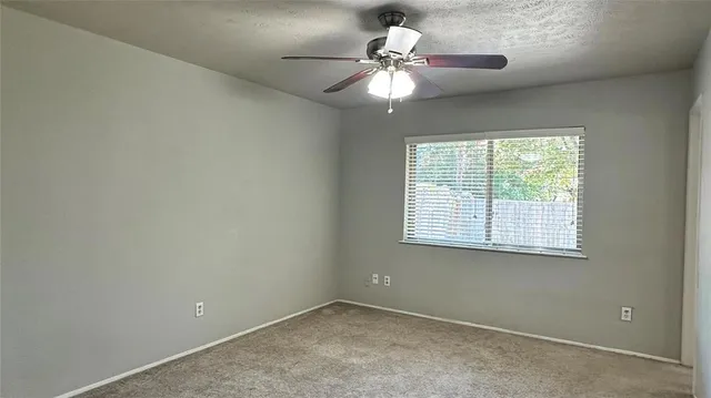 en view of an empty room with a window