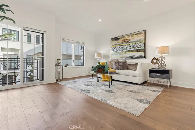 a living room with furniture and a rug