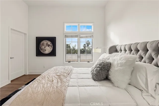 a view of a hallway with washer and dryer