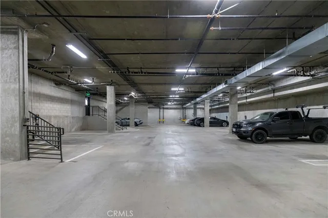 a view of a house with potted plants