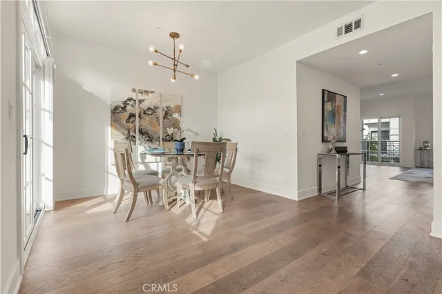 a bathroom with a sink a mirror and vanity