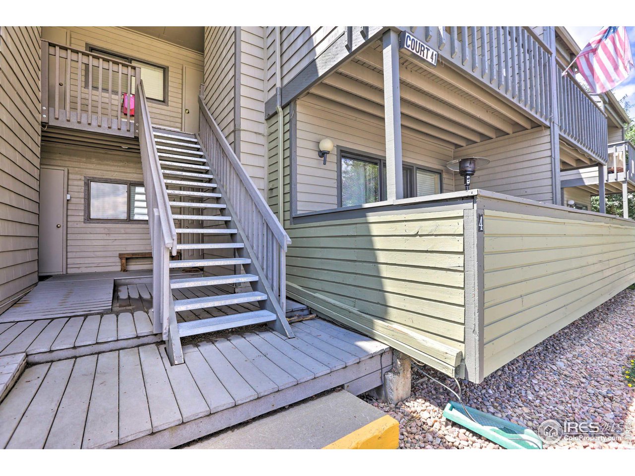 83 County Road, Unit A9 Fraser, CO 80442 - Photo 21 of 23 a view of a balcony with wooden floor and fence