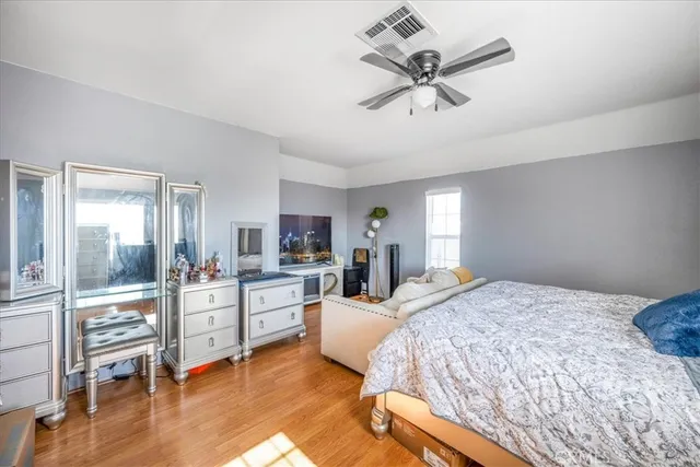 a bed room with a bed and furniture