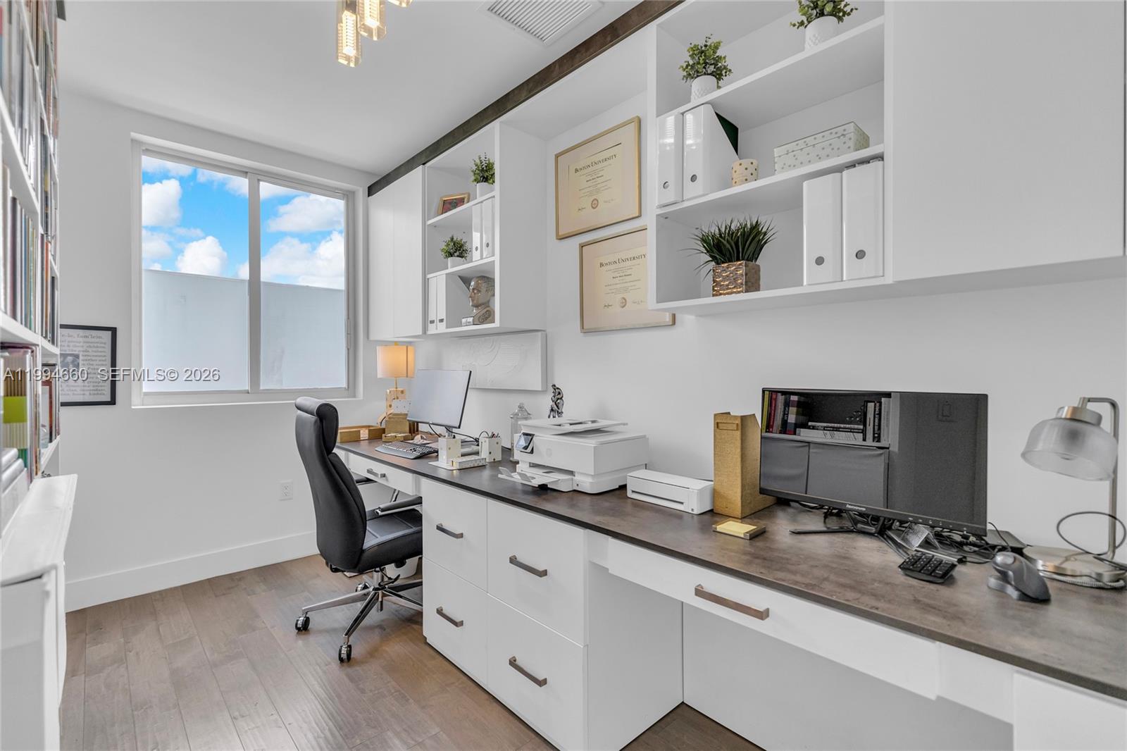 16631 Sunset Way Weston, FL 33326 - Photo 24 of 59 a view of a workspace with furniture