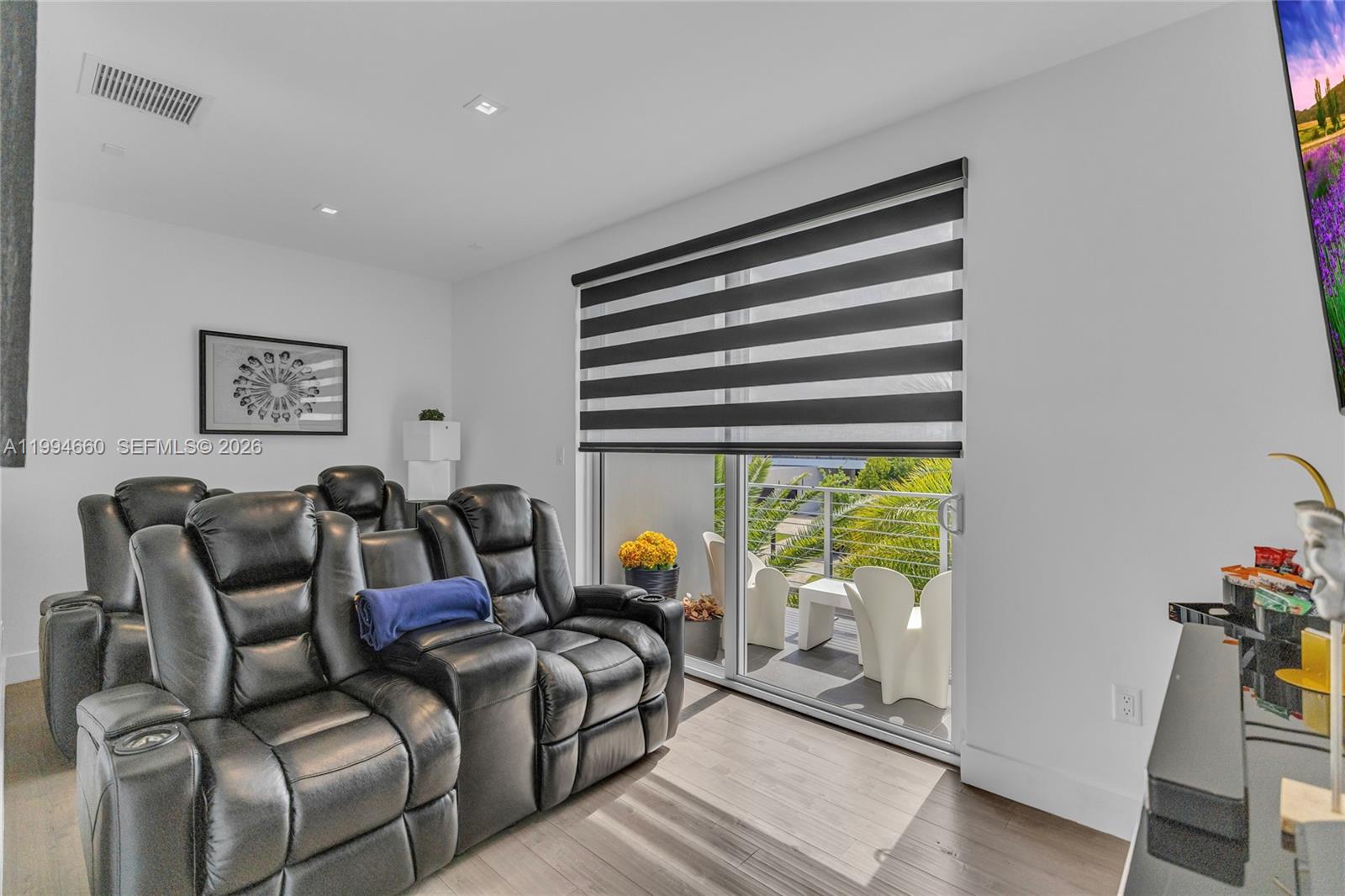 16631 Sunset Way Weston, FL 33326 - Photo 26 of 59 a living room with furniture and a window