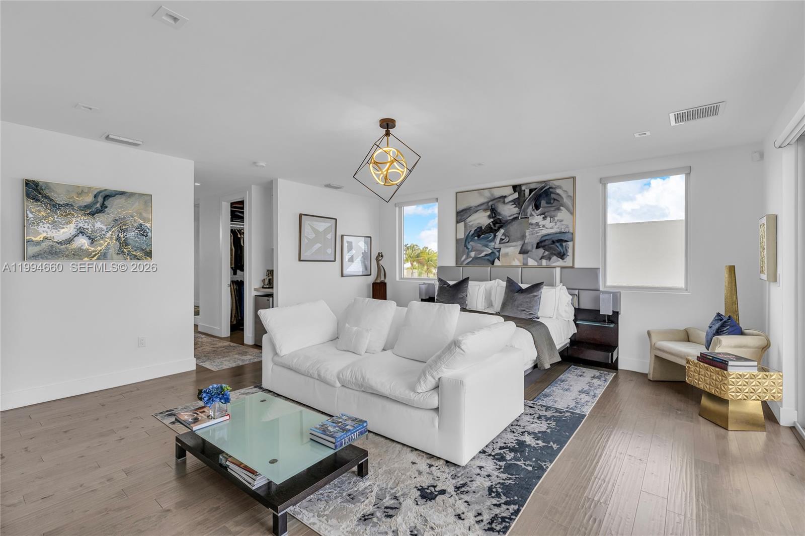 16631 Sunset Way Weston, FL 33326 - Photo 33 of 59 a bed room with furniture and a window