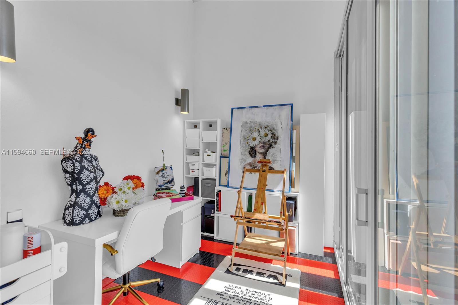 16631 Sunset Way Weston, FL 33326 - Photo 41 of 59 a room with toys and book shelf