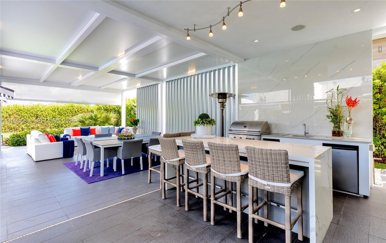 16631 Sunset Way Weston, FL 33326 - Photo 45 of 59 a view of a dining room with furniture window and outside view