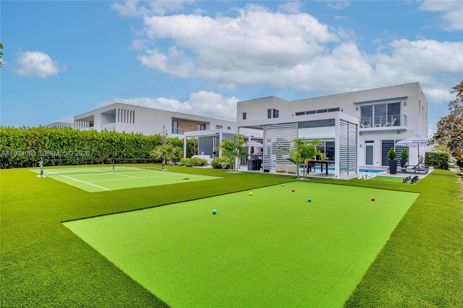 16631 Sunset Way Weston, FL 33326 - Photo 53 of 59 a front view of building with yard