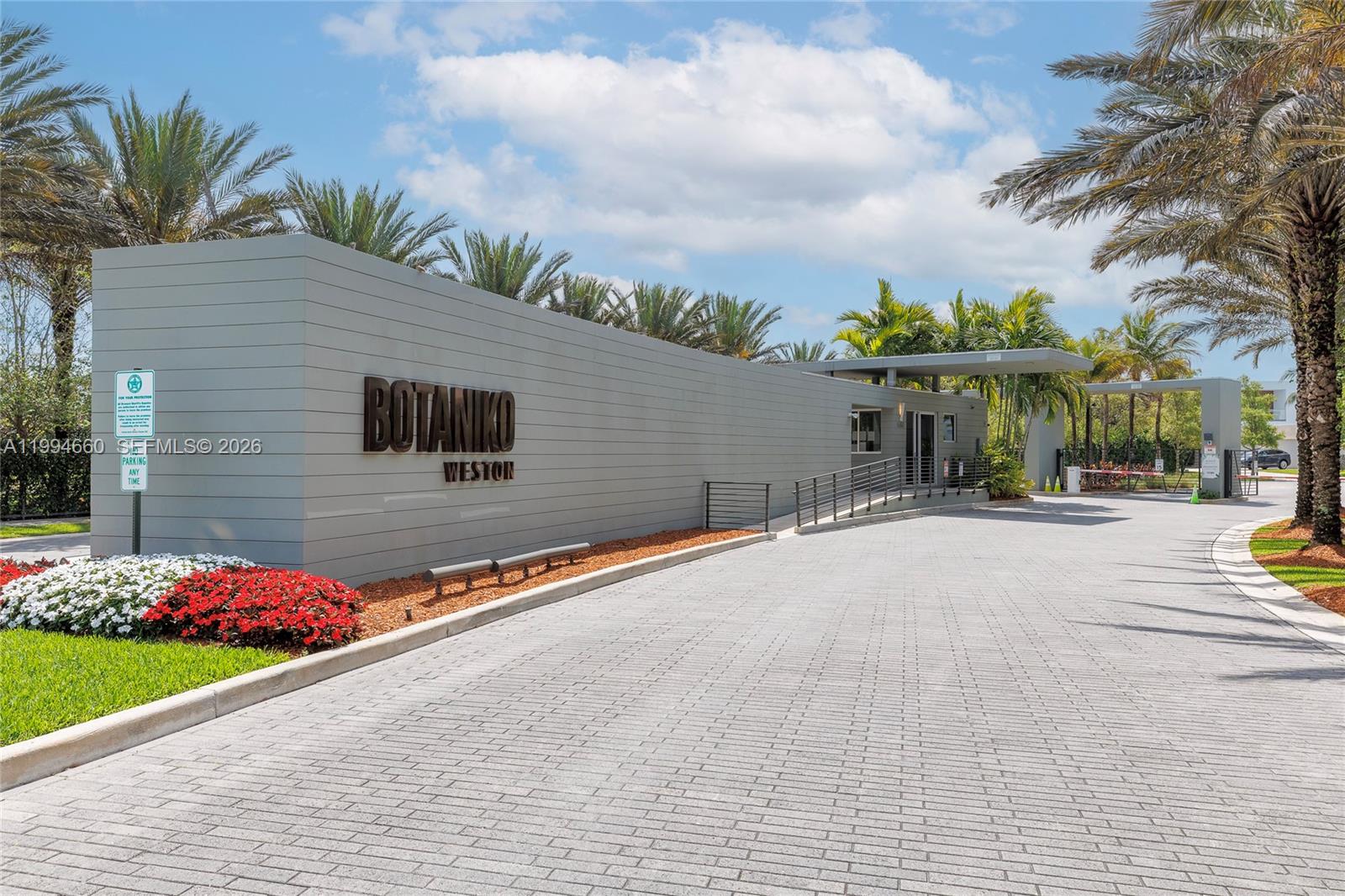 16631 Sunset Way Weston, FL 33326 - Photo 59 of 59 a view of a terrace with a bench and potted plants