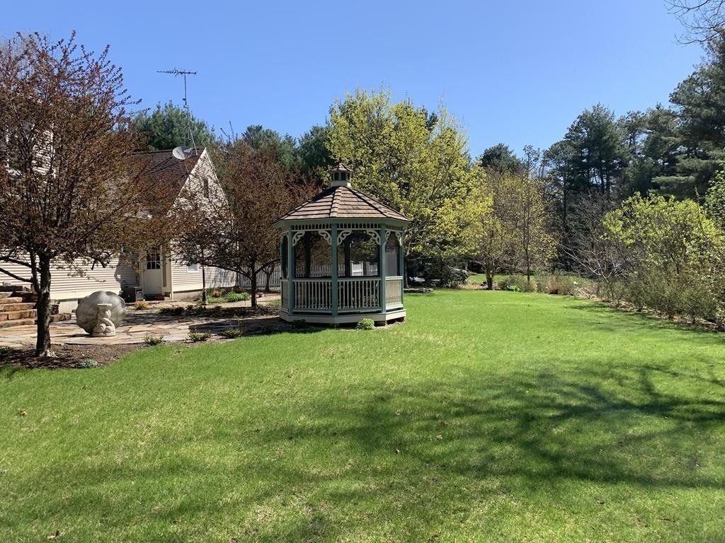 15 Fenton Road Monson, MA 01057 - Photo 13 of 41 a view of a house with a yard patio and fire pit