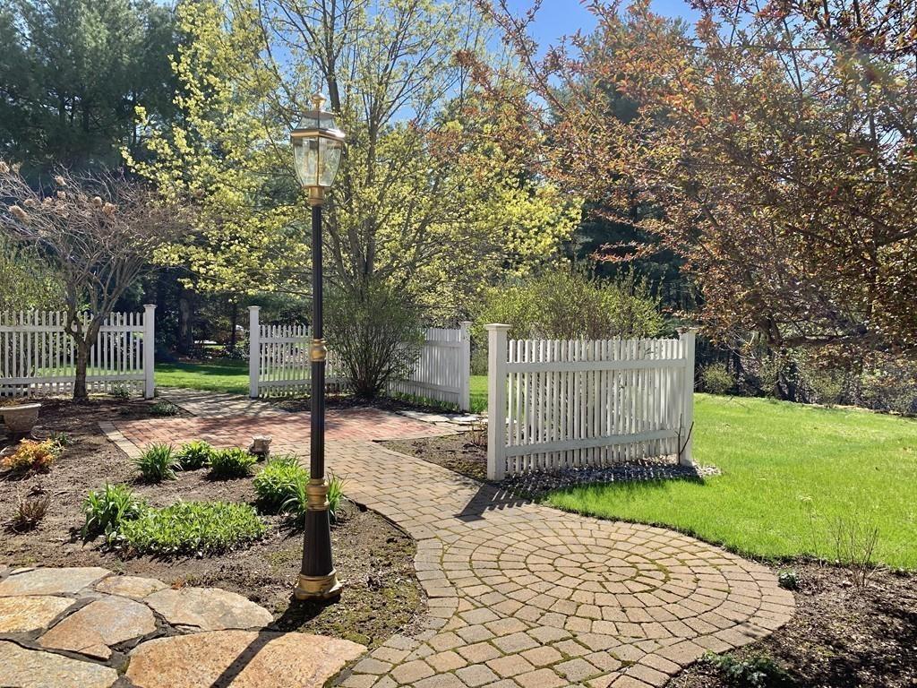 15 Fenton Road Monson, MA 01057 - Photo 15 of 41 a view of a backyard with large trees and plants