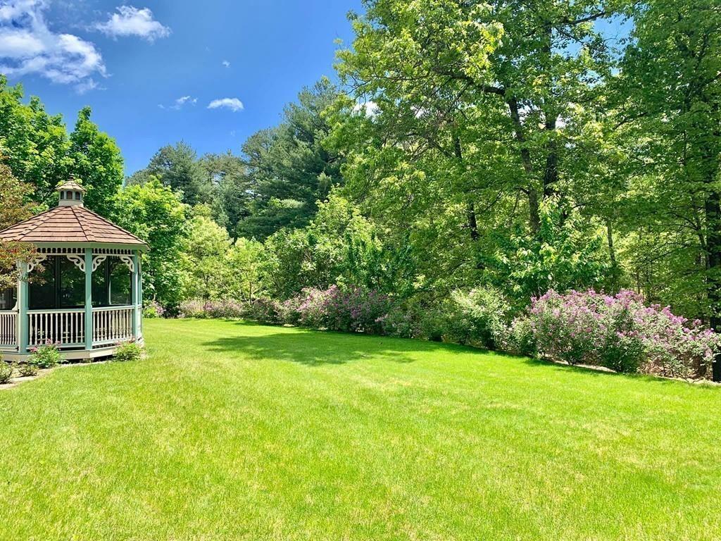 15 Fenton Road Monson, MA 01057 - Photo 17 of 41 a view of a backyard with a garden and entertaining space