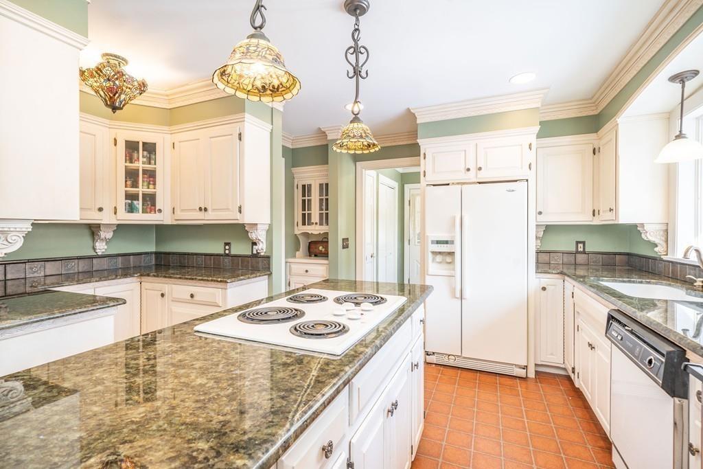 15 Fenton Road Monson, MA 01057 - Photo 23 of 41 a kitchen with stainless steel appliances granite countertop a sink stove and refrigerator