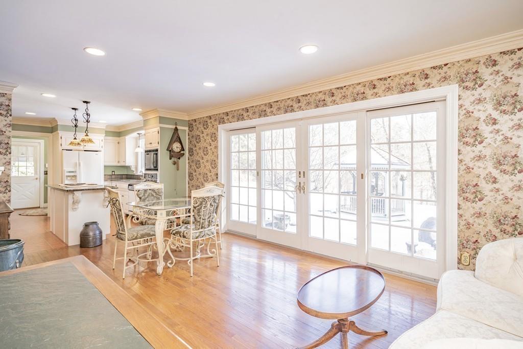15 Fenton Road Monson, MA 01057 - Photo 27 of 41 a dining room with furniture a chandelier and wooden floor