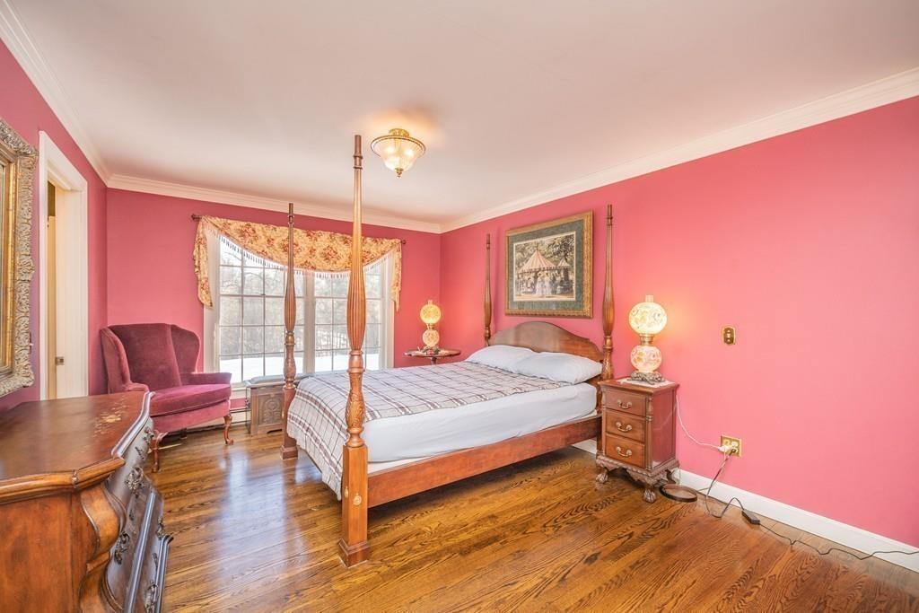 15 Fenton Road Monson, MA 01057 - Photo 32 of 41 a bedroom with a bed and wooden floor
