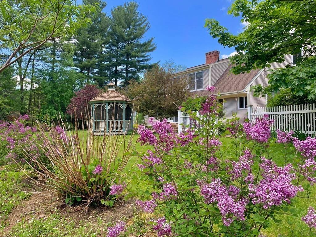 15 Fenton Road Monson, MA 01057 - Photo 7 of 41 a front view of a house with a yard and fountain
