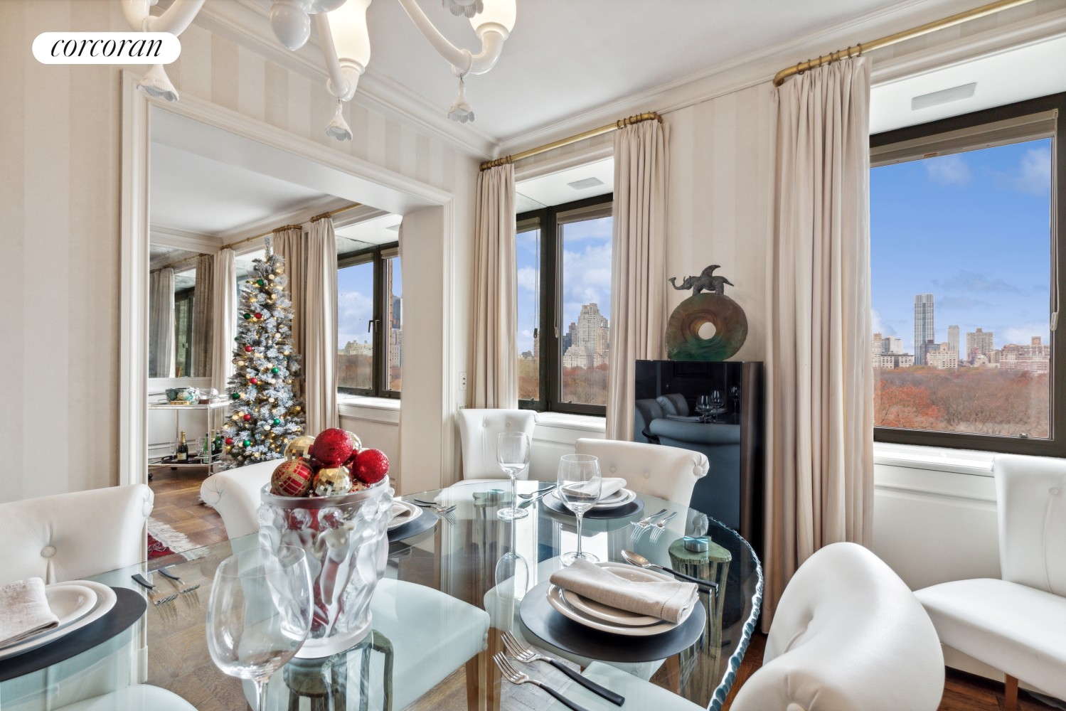 875 5th Avenue, Unit 12B Manhattan, NY 10065 - Photo 5 of 23 a view of a dining room with furniture window and wooden floor