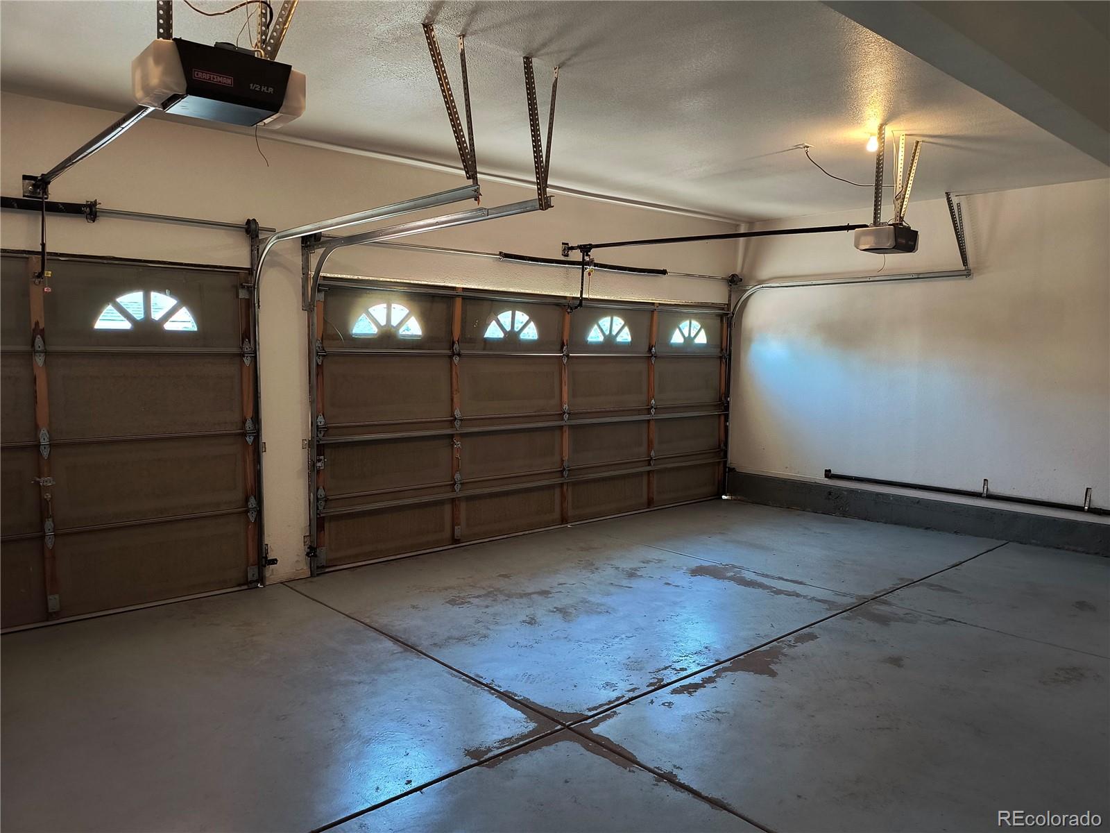 10145 Charissglen Lane Highlands Ranch, CO 80126 - Photo 32 of 39 a view of a garage