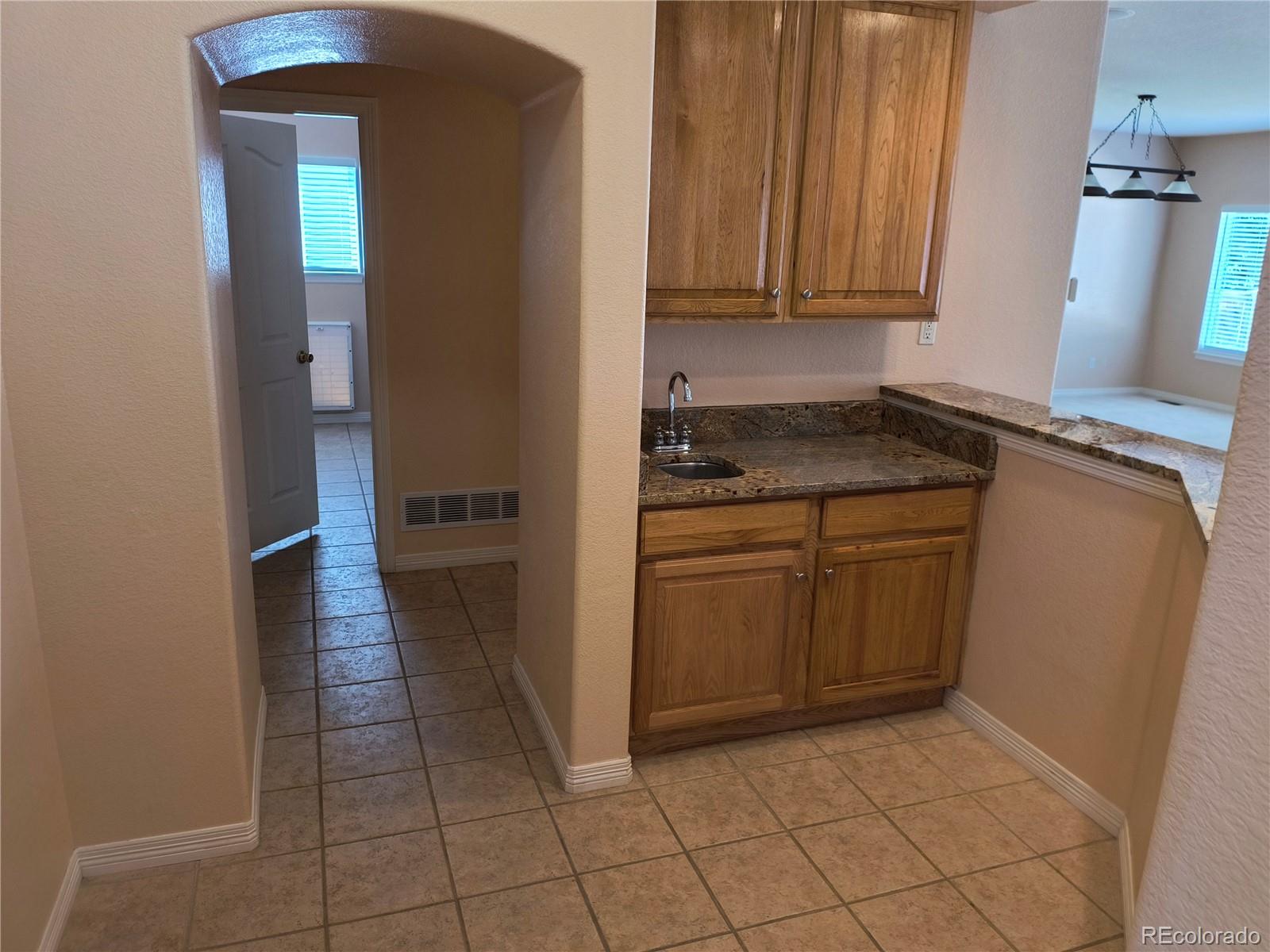 10145 Charissglen Lane Highlands Ranch, CO 80126 - Photo 9 of 39 a view of a storage and utility room